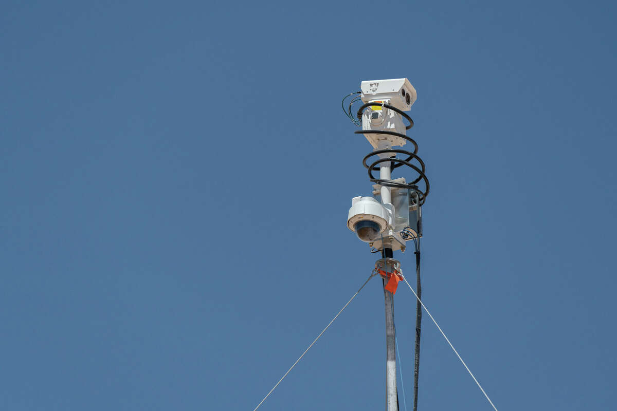 One of the sensors ExxonMobil uses to track emissions at its Permian Basin operations, sending data back to the company's Center for Operations and Methane Emissions Tracking in Houston. The company is testing 30 technologies over an eight-month period, including sensors attached to stratospheric balloons.