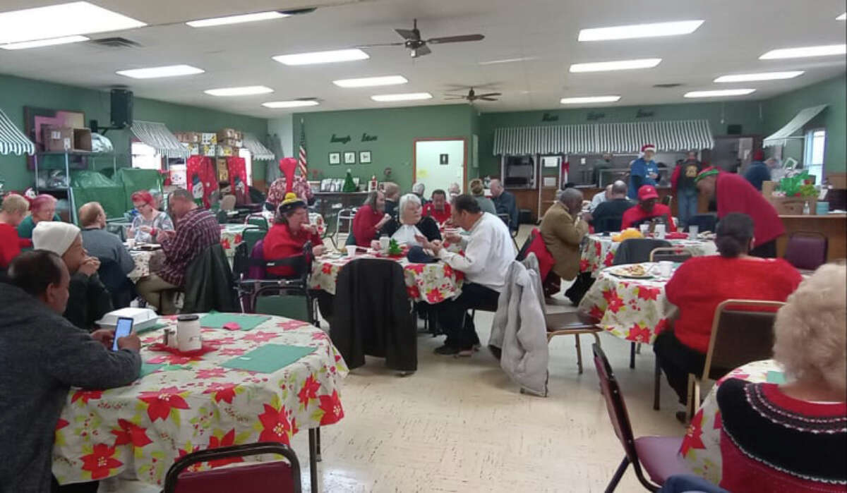 Community members have a chance to join together for a tasty Christmas dinner.