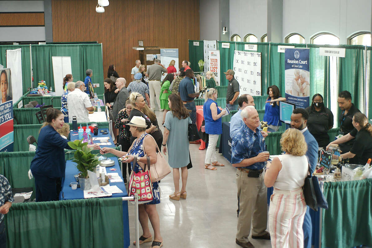 Visitors chat with business representatives during the 2021 League City Business Expo and Home and Garden Show at the Johnnie Arolfo Civic Center. This year, the city is on pace to top sales tax revenue from 2021, averaging $2.81 million per month through October. Over the same period last year, the average was $2.65 million.