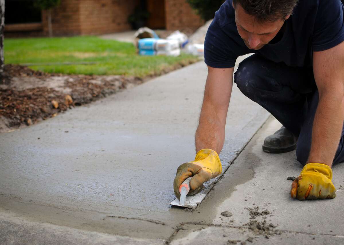 Driveways - Midwest: #9 most common home renovation project - Northeast: Did not rank in top 10 - South: #10 most common home renovation project - West: Did not rank in top 10 Extreme weather wreaks havoc on driveways, making them popular renovation projects in the Midwest, where winters are intense and weather swings wildly in both directions, and the South, where heatwaves and other major weather events can cause buckling. Asphalt can be damaged by the weight of snow and also by rock salt, which speeds up deterioration from freezing and thawing throughout many seasons. On the other end is extreme heat, which can also cause driveway expansion and contraction. Eventually, homeowners in both scenarios may be left with badly damaged or collapsing driveways. In some areas of the Midwest, temperatures drop below zero and, at other times of the year, climb above 100 degrees. Precipitation is typical, including snow in winter—with Minnesota's most Northern area, the region's most Northern state, receiving an average of 70 inches of snow a year. The Midwest also experiences tornadoes, with the state of Iowa experiencing an average of 48 every year. Hurricanes and tropical storms hit hard in the South, where more than one-third of adults in a 2021 Pew Research Center survey reported they experienced extreme weather within the previous year.