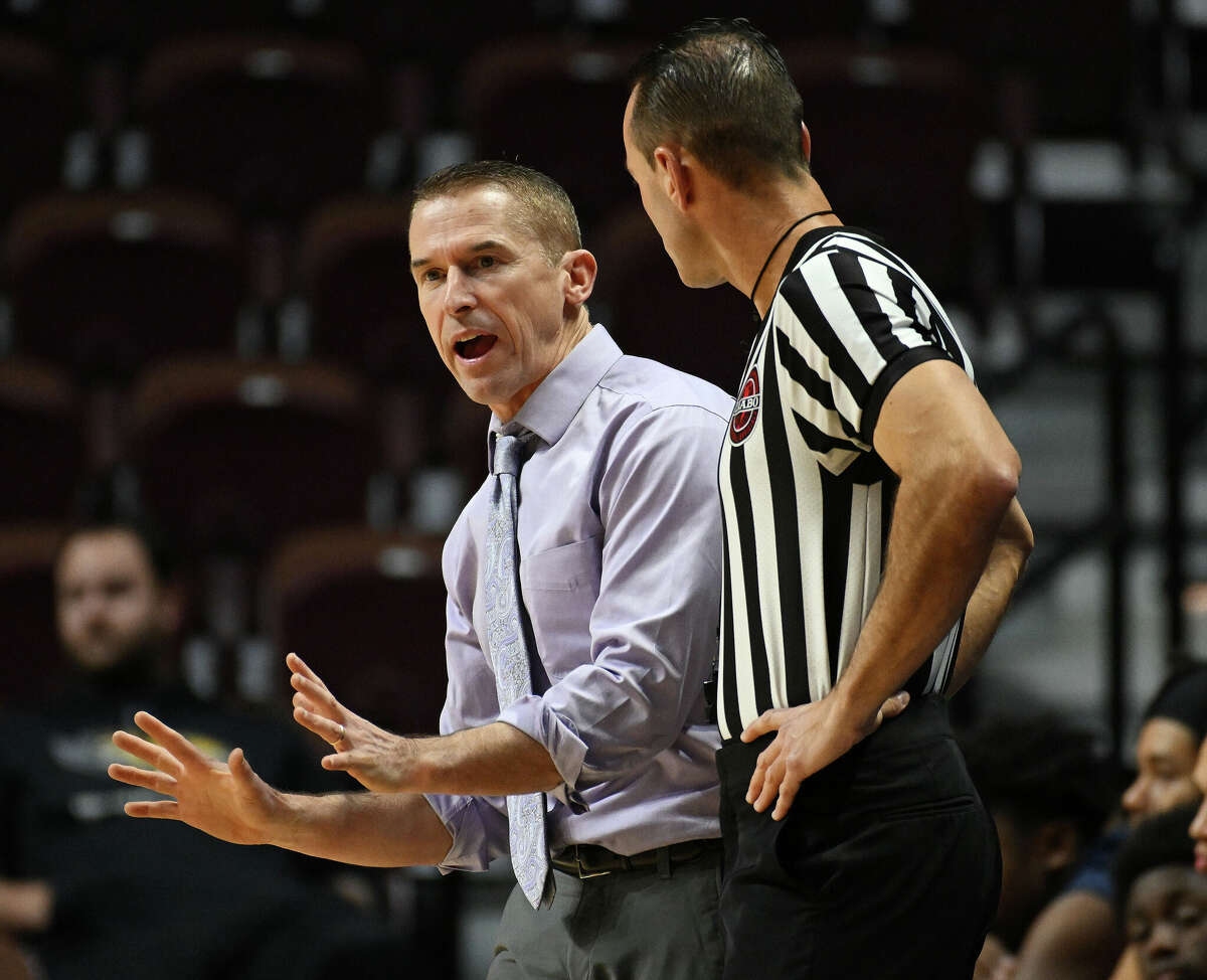 East Catholic head coach Luke Reilly makes his point to the official during non-league boys high school basketball action against Notre Dame Monday, December 19, 2022 at Mohegan Sun Arena. East Catholic came back in the second half for the 62-50 win. (Sean D. Elliot/Special to GameTimeCT)