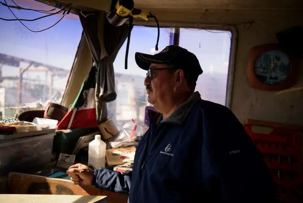Alex Gutierrez, an oyster harvester, conducts routine maintenance on his boat Thursday in San Leon. Gutierrez said he and everyone else who depends on Gulf of Mexico oysters for their livelihood are going to suffer major economic losses after the state shut down several harvesting areas.