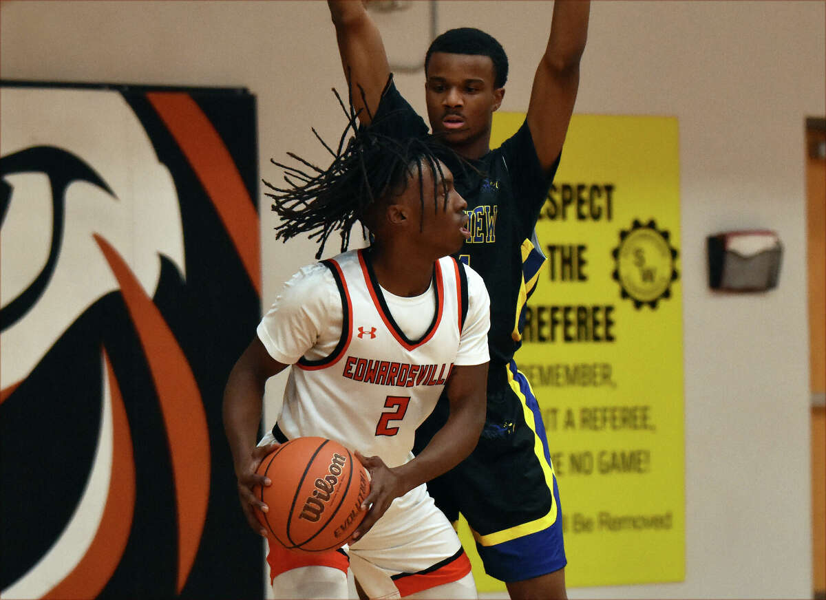Edwardsville's Malik Allen works in the post against Riverview Gardens in the first half on Monday at Lucco-Jackson Gymnasium in Edwardsville.