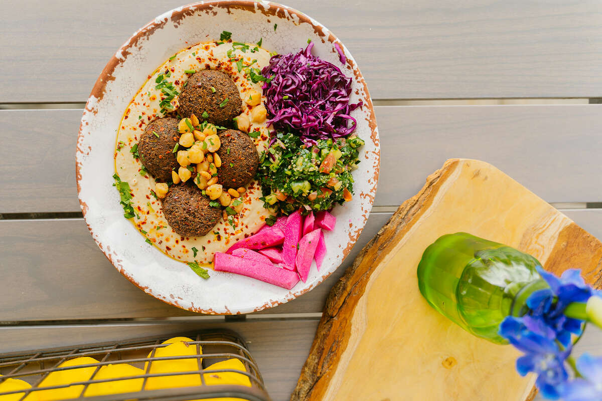 At Craft Pita, you can add falafel and other proteins to your hummus bowl.