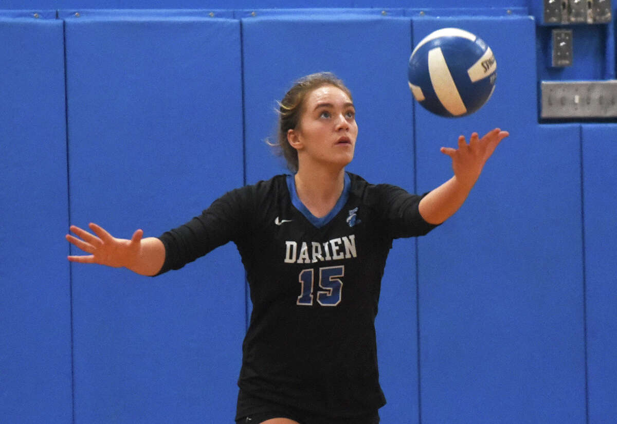 Darien's Leilani Gillespie (15) gets set to serve against Southington during the CIAC Class LL girls volleyball semifinals at Bunnell on Wednesday, Nov. 16, 2022.