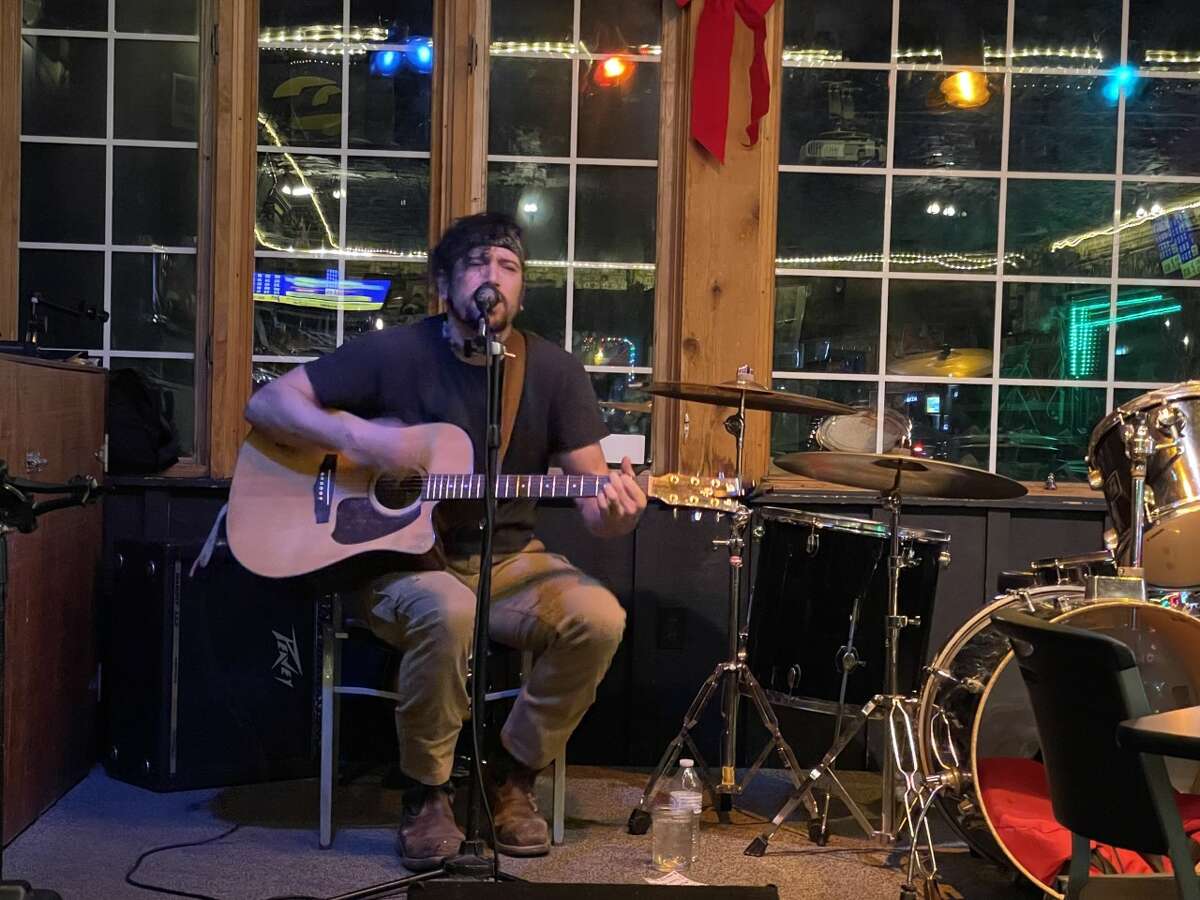 Elias playing at the Sawmill Saloon.