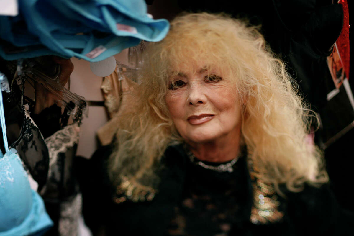 Legendary North Beach stripper Carol Doda works at her champagne and lace lingerie store in San Francisco on Tuesday, July 14, 2009.