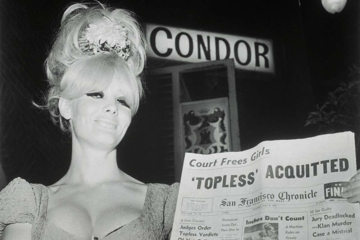 Carol Doda headlines San Francisco's North Beach showing off the Condor front she performed after her 1965 acquittal for dancing topless. 