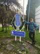 Sam Heughan at the "original end of the West Highland Way." There, "a statue of a weary Highland walker marks the new finish line in the town square. He is occasionally decorated with a traffic cone by local youths, as is the Scottish way," Heughan writes.