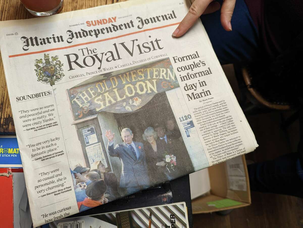 A copy of the Marin Independent Journal from 2005, when the saloon hosted then-Prince Charles and Camilla, Duchess of Cornwall.