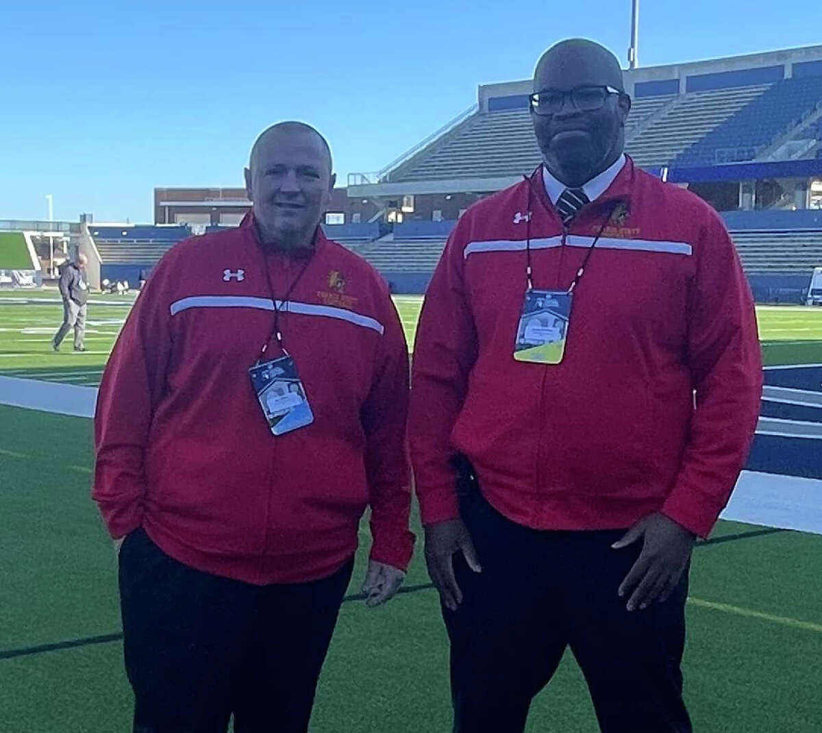 Rob Bentley (left) and Sandy Gholston get ready to broadcast Saturday's Ferris football national championship game in McKinney, Texas.