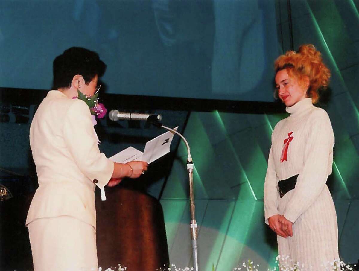 Maric is presented an award for "most courageous and inspiring young scientist" in Kyoto, Japan, in 1994 by Soroptimist International, a global volunteer service organization for women.