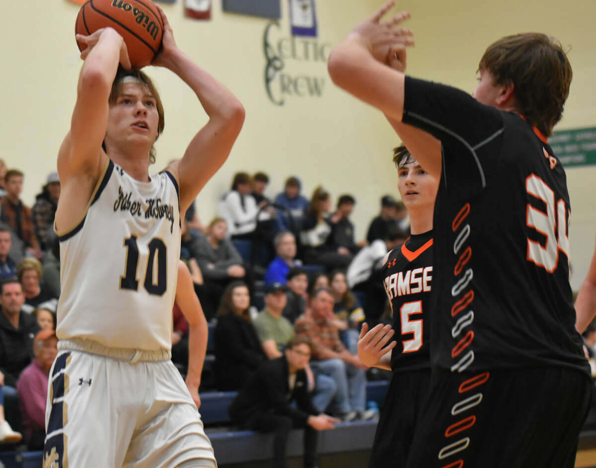 Father McGivney's Jackson Rodgers scored 16 points in Monday's loss to Taylorville in Litchfield.