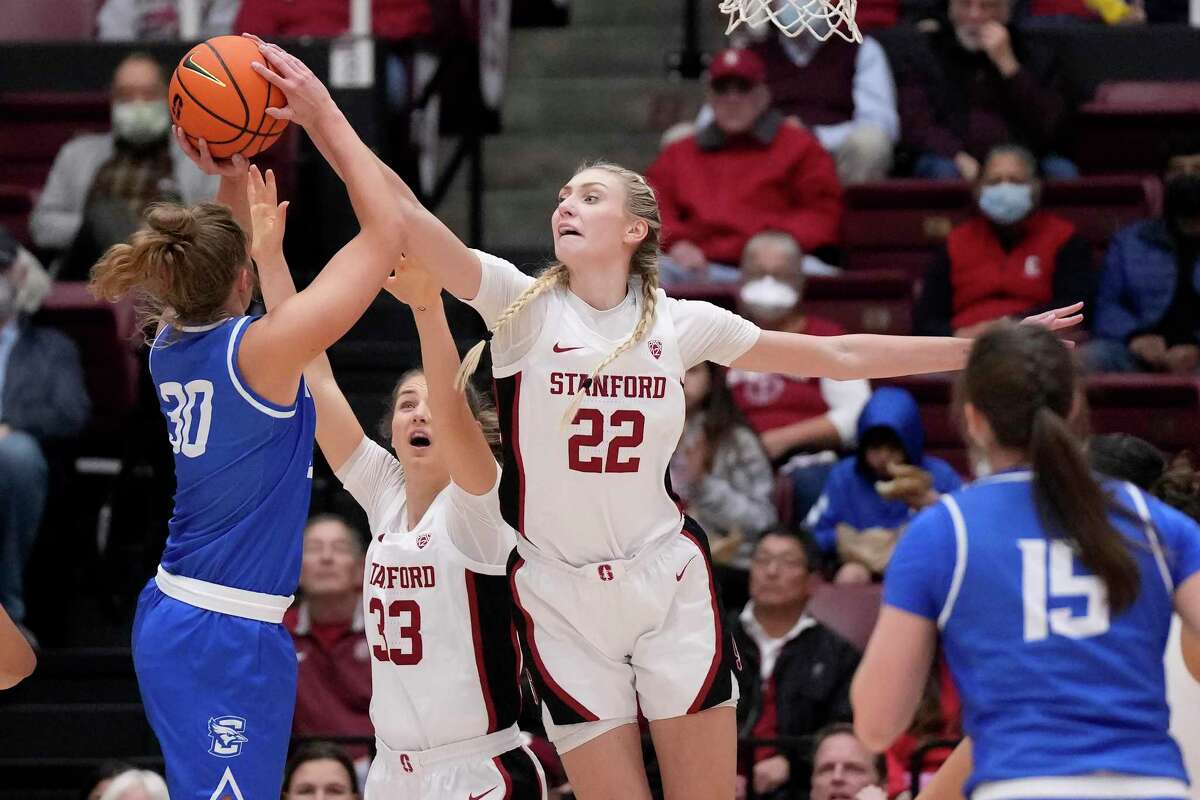 Stanford forward Cameron Brink (22) blocks a shot attempt by Creighton guard Morgan Maly during the first half of an NCAA college basketball game in Stanford, Calif., Tuesday, Dec. 20, 2022. (AP Photo/Jeff Chiu)