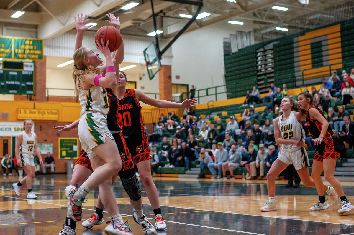 Dow High's Lauren VanSumeren takes it to the rim during a Dec. 20, 2022 game against Flushing. VanSumeren had 12 points, six rebounds, and five steals in Tuesday's win over Bay City Central.