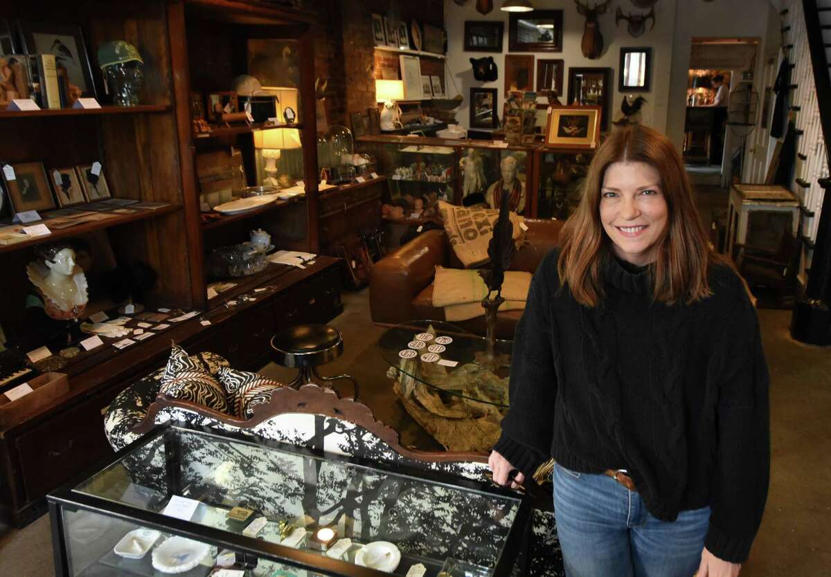 Former magazine editor Sarah Gray Miller in the showroom of her antiques store, UnQuiet Antiques, on Thursday, Dec. 8, 2022, in Coxsackie, N.Y.