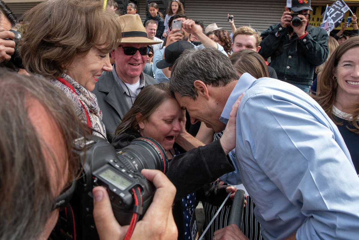 Beto O'Rourke greets his sister Erin after giving a speech at a campaign rally in El Paso, Texas in 2019.
