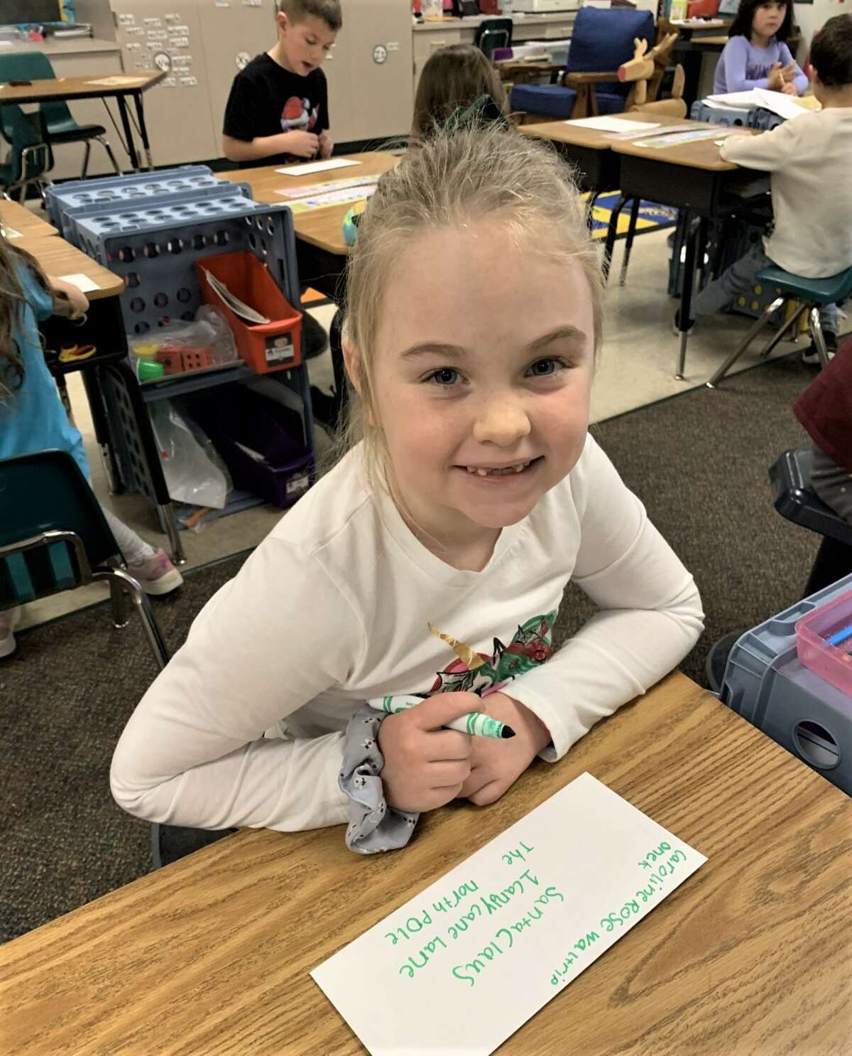 Onekama first graders mail letters to Santa