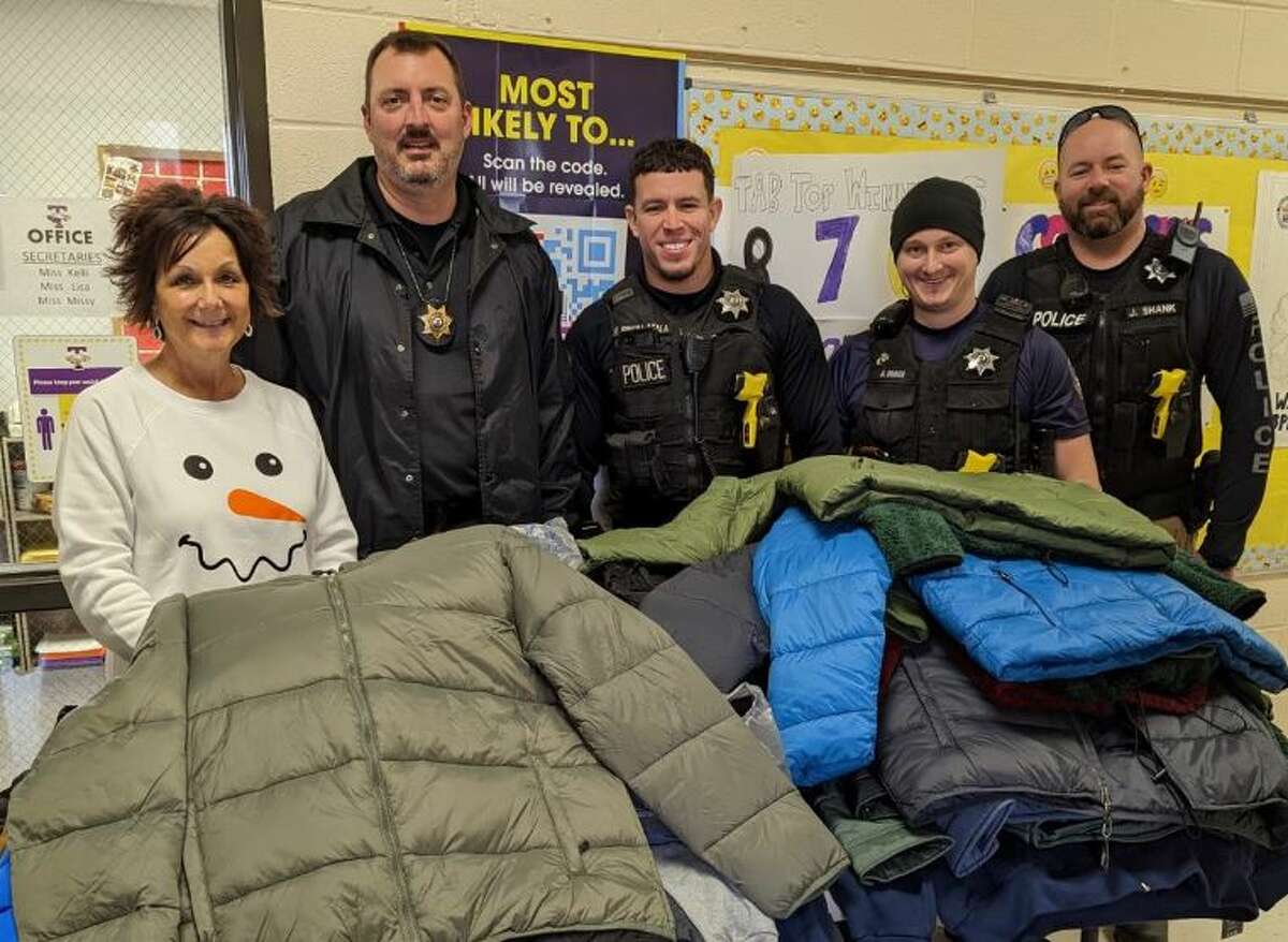 Members of the Bethalto Police Department recently shopped for a wish list of nearkly $800 in coats, gloves, hats, folders, pencils and supplies for Bethalto school students. The money used was raised by the department’s Christmas for All campaign.