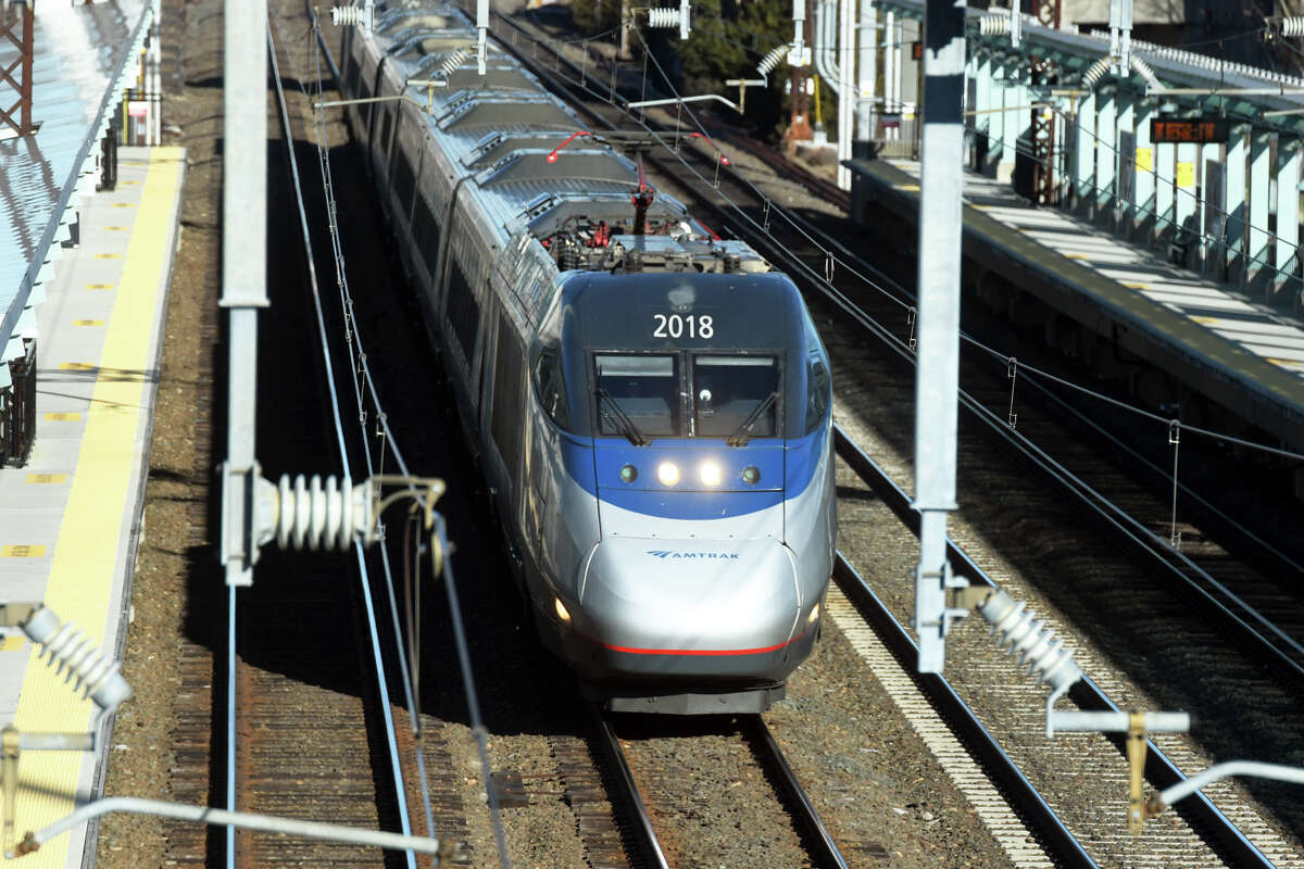 A southbound Amtrak Acela travels through the Fairfield Metro Station, in Fairfield, Conn. Dec. 20, 2022.