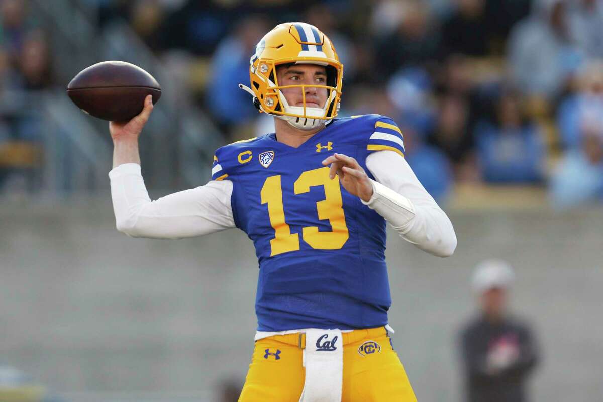 California quarterback Jack Plummer (13) passes against UCLA during the first half of an NCAA college football game in Berkeley, Calif., Friday, Nov. 25, 2022. (AP Photo/Jed Jacobsohn)