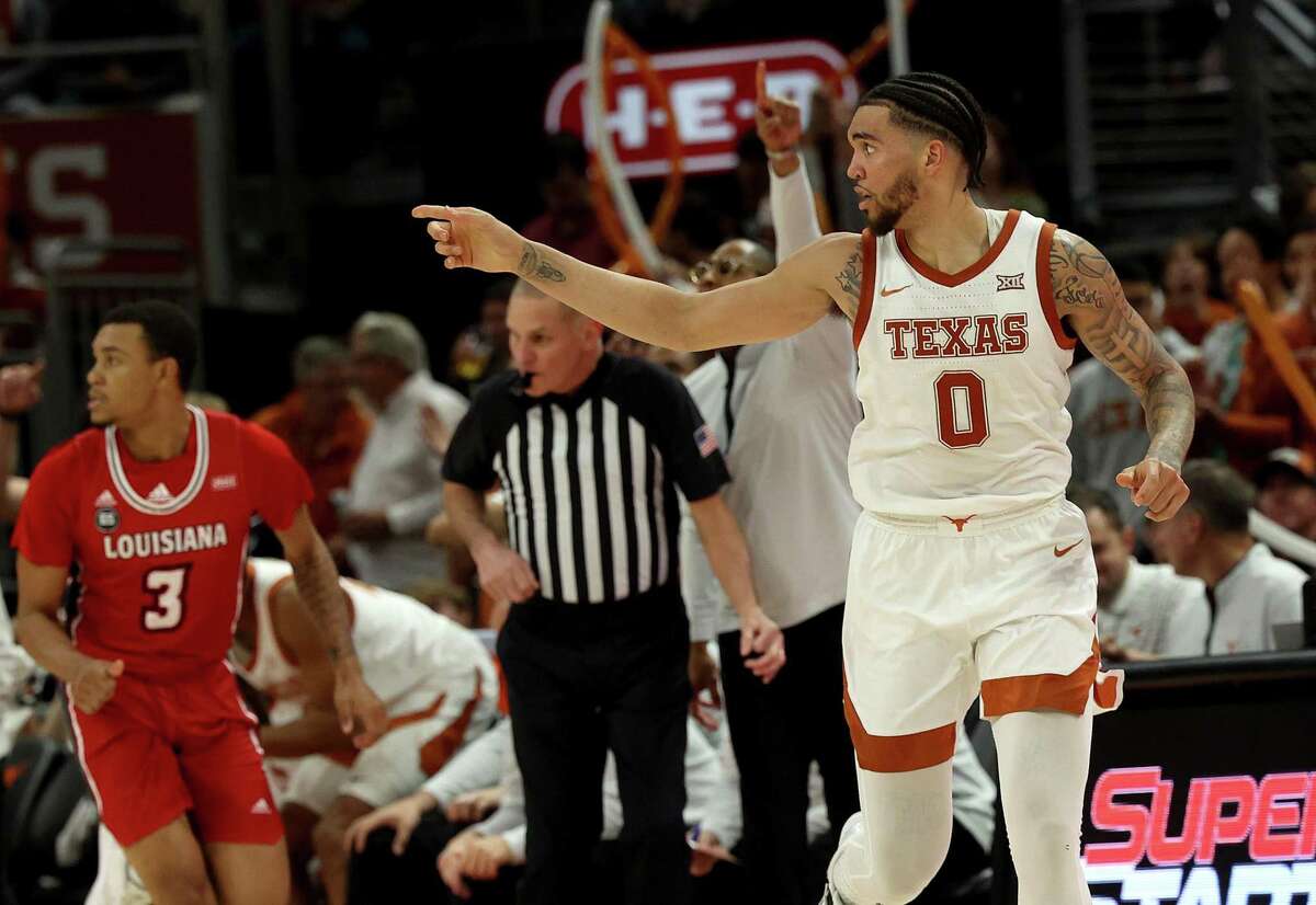 Texas’ Timmy Allen reacts after hitting a three-pointer during Wednesday night’s game against Louisiana Lafayette at Moody Center in Austin.