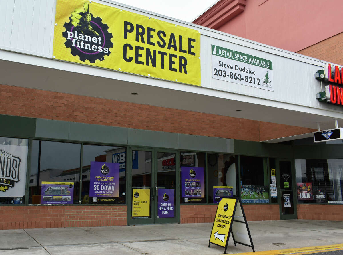 A Planet Fitness enrollment office in December 2022 at the Danbury Square plaza on Backus Avenue in Danbury, Conn. The chain is taking over a retail box once occupied by Babies "R" Us.