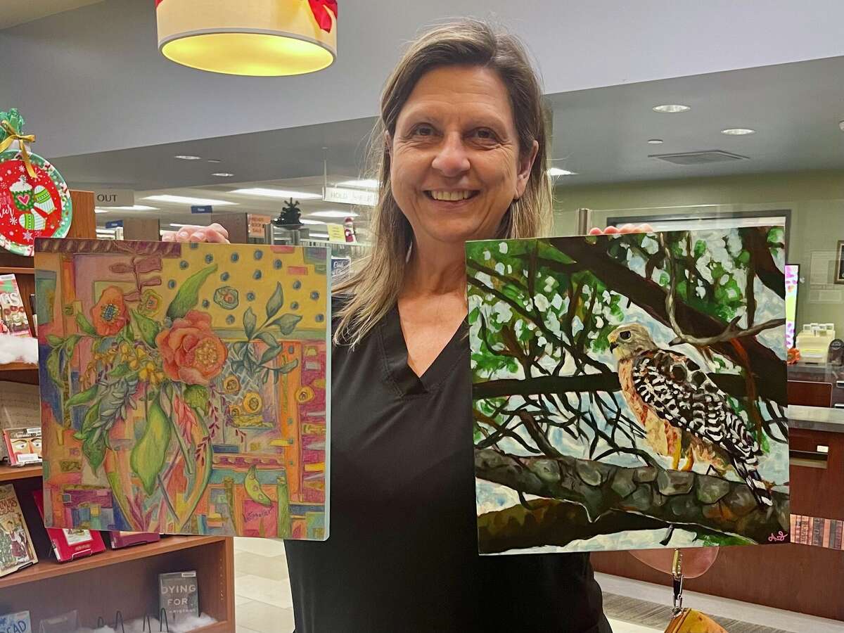  Local artist Cindy Williams-Ware entered a piece of art and won two in the  Friendswood Rotary Club's 12X12 Art Project auction.