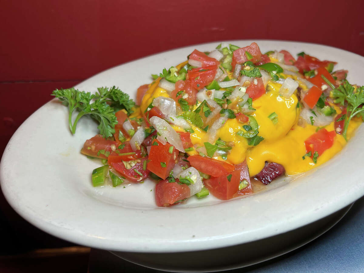 Chopped sirloin with queso from The Barn Door is one of the Top 25 dishes of 2022.