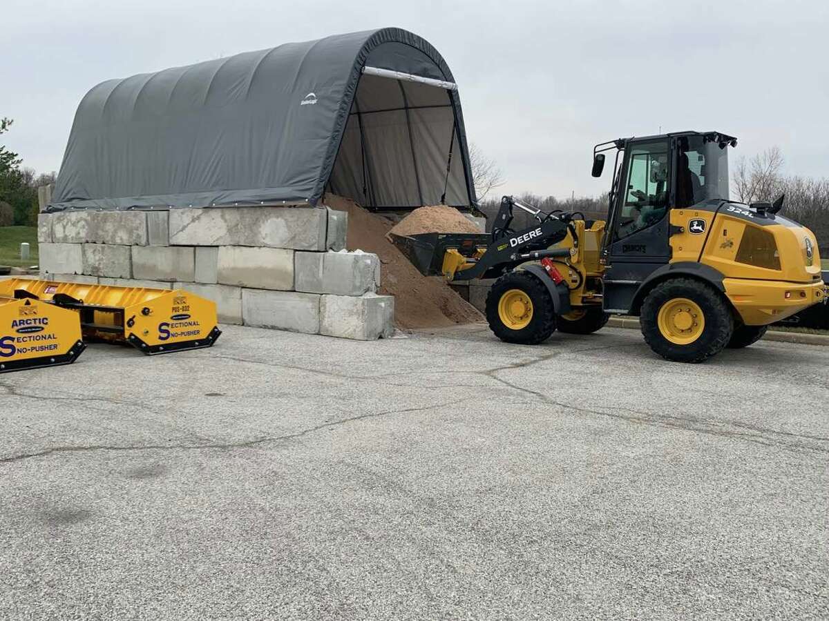 Church's Snow Removal, which is contracted by the city to help spread salt, prepares Thursday for the winter snow storm at the salt shed behind the Edwardsville Crossing shopping center. 