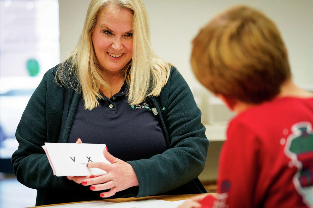Tammy Spencer, founder of Dyslexia School of Houston, practices the alphabet with a student Wednesday, Dec. 21, 2022, at the school in West University Place.