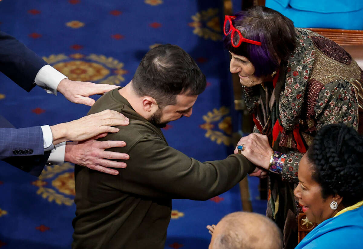 President of Ukraine Volodymyr Zelensky greets Rep. Rosa Delauro (D-CT) and other lawmakers as he arrives to address a joint meeting of Congress in the House Chamber of the U.S. Capitol on December 21, 2022 in Washington, DC.