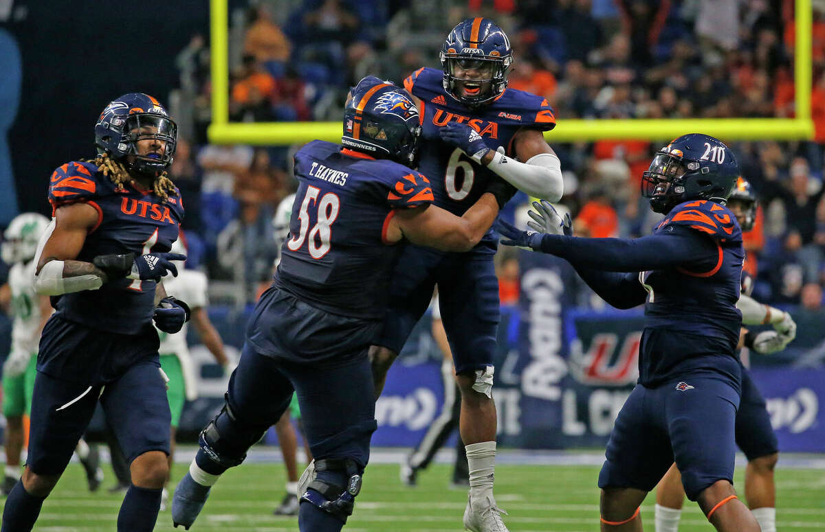 Safety Kelechi Nwachuku #6 of the UTSA Roadrunners celebrates an interception against North Texas Mean Green in the second half at Alamodome on December 2, 2022 in San Antonio, Texas.