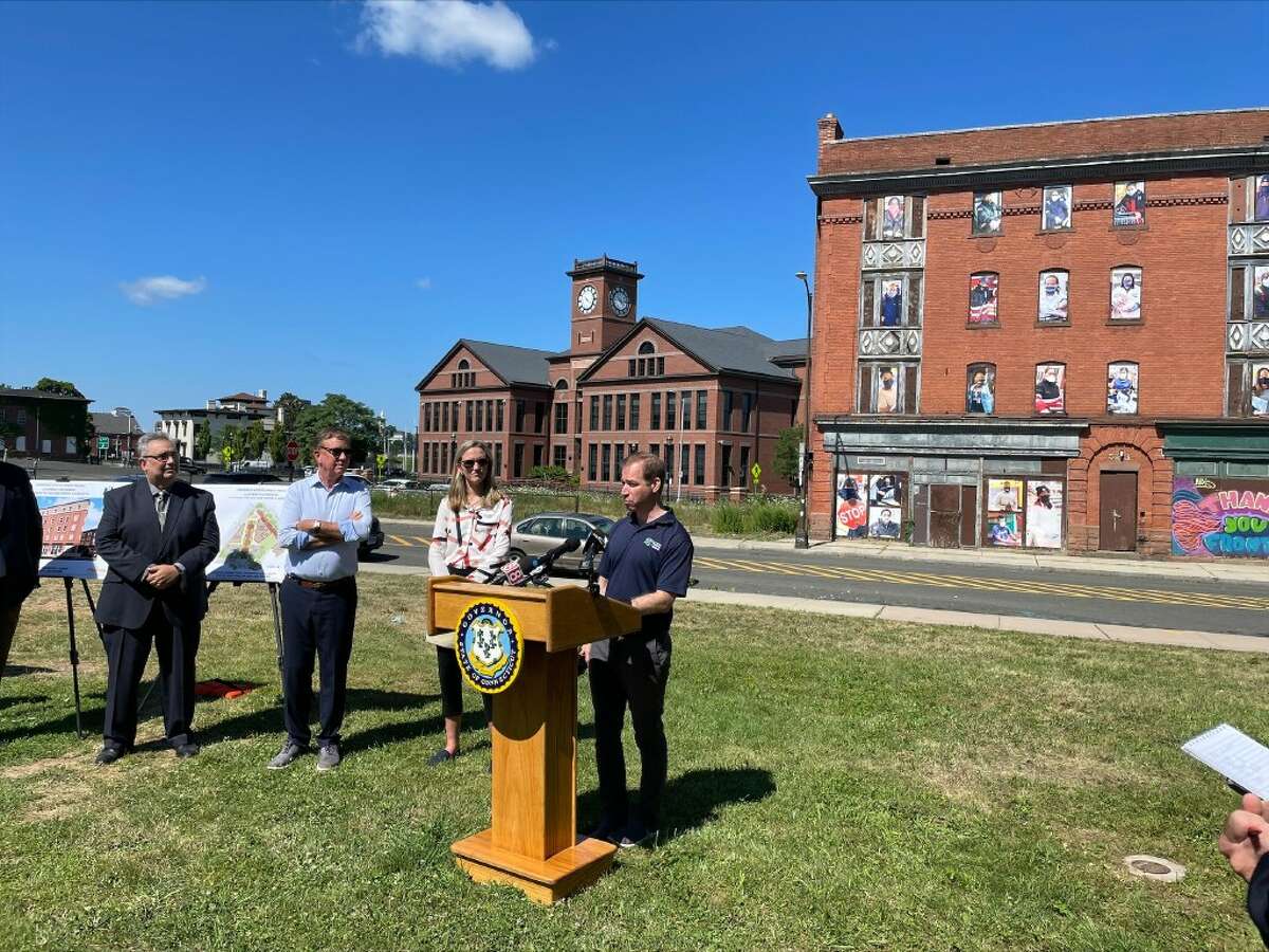Hartford Mayor Luke Bronin speaks during a news conference in Hartford in July announcing a $6.3 million Connecticut Communities Challenge Grant to be used to help redevelop the area near Dunkin’ Donuts Park.