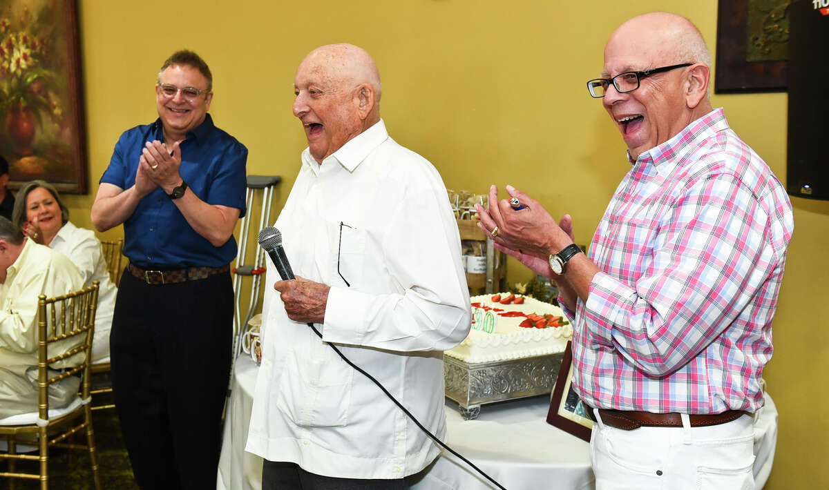 Pancho Staggs, left, and Raul Staggs, right, accompany their father, Frank Staggs, during a speech on July 8, 2017 at La Posada Hotel as friends and family celebrate Frank Staggs' 90th birthday. Frank Staggs died Dec. 20, 2022 at the age of 95.