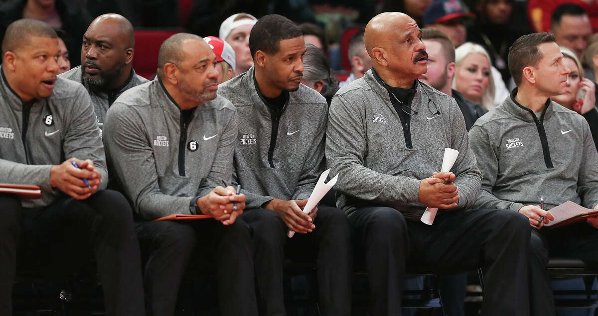 Houston Rockets head coach Stephen Silas, center, and his coaching staff sit on the bench in the first half at the Toyota Center on Monday, Dec. 19, 2022 in Houston.