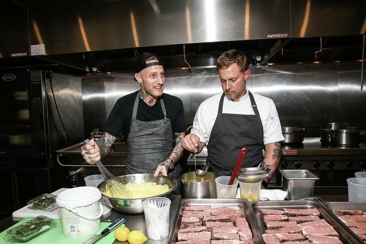 Chefs Michael and Brian Voltaggio prepare a meal during the dinner portion of The Bank of America Dinner Series presented by The Wall Street Journal on October 12, 2018 at Spring Place, New York City. The chef brothers are set to open a new Italian restaurant, Vulcania, at The Village at Mammoth in January. 