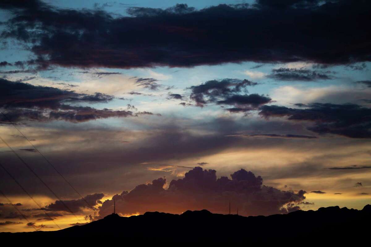 View of a sunset from the El Paso shooting makeshift memorial on Wednesday, Aug. 7, 2019.