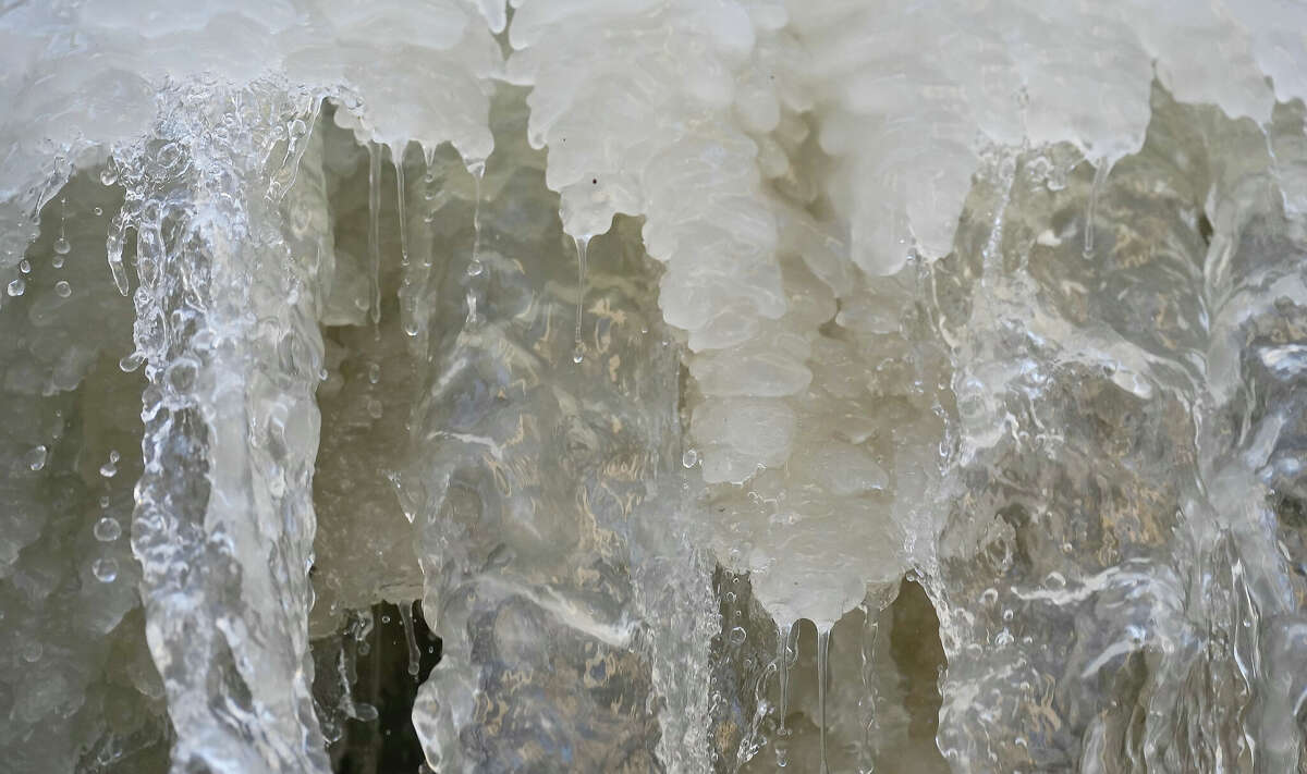 Ice accumulates connected  the fountain astatine  Bob Smith Park successful  downtown Houston ices the country  arsenic  temperatures stay  beneath  freezing connected  Friday, Dec. 23, 2022.