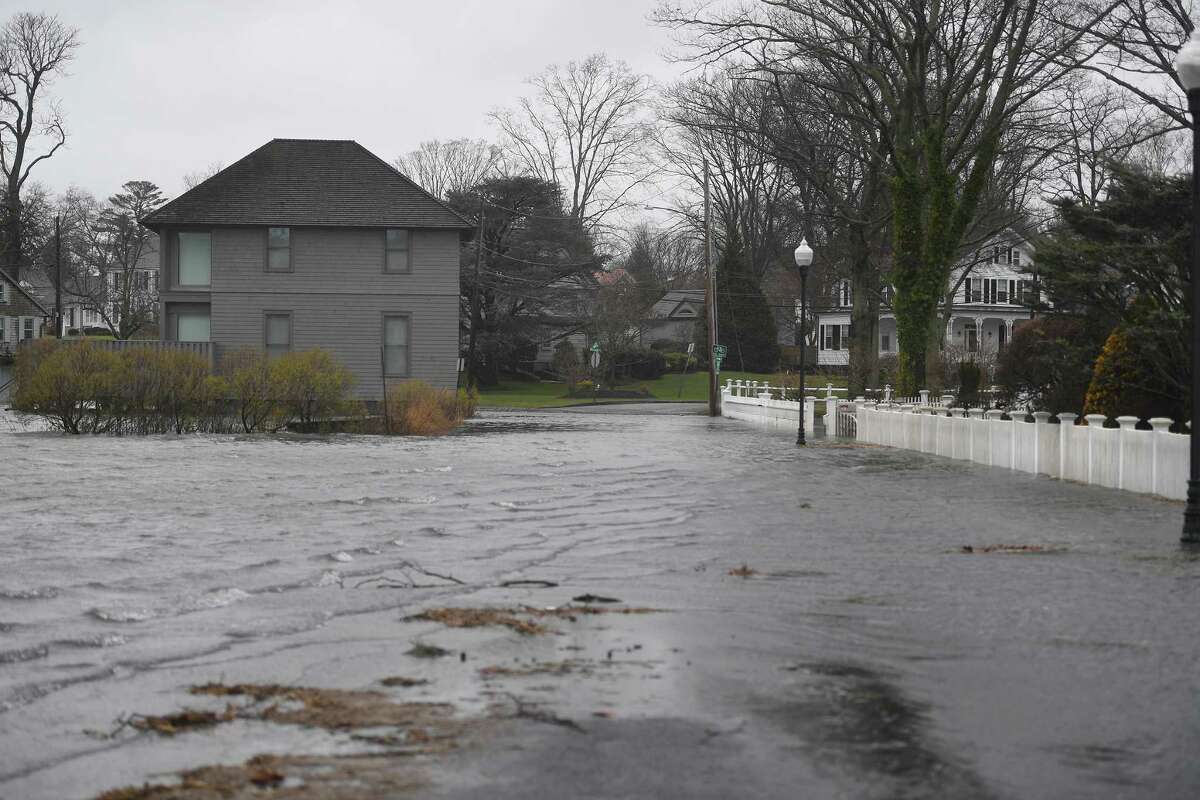 The waters of Southport Harbor flood Harbor Road arsenic  precocious   tide nears during the noreaster tempest  successful  Southport, Conn. connected  Friday, December 23, 2022.