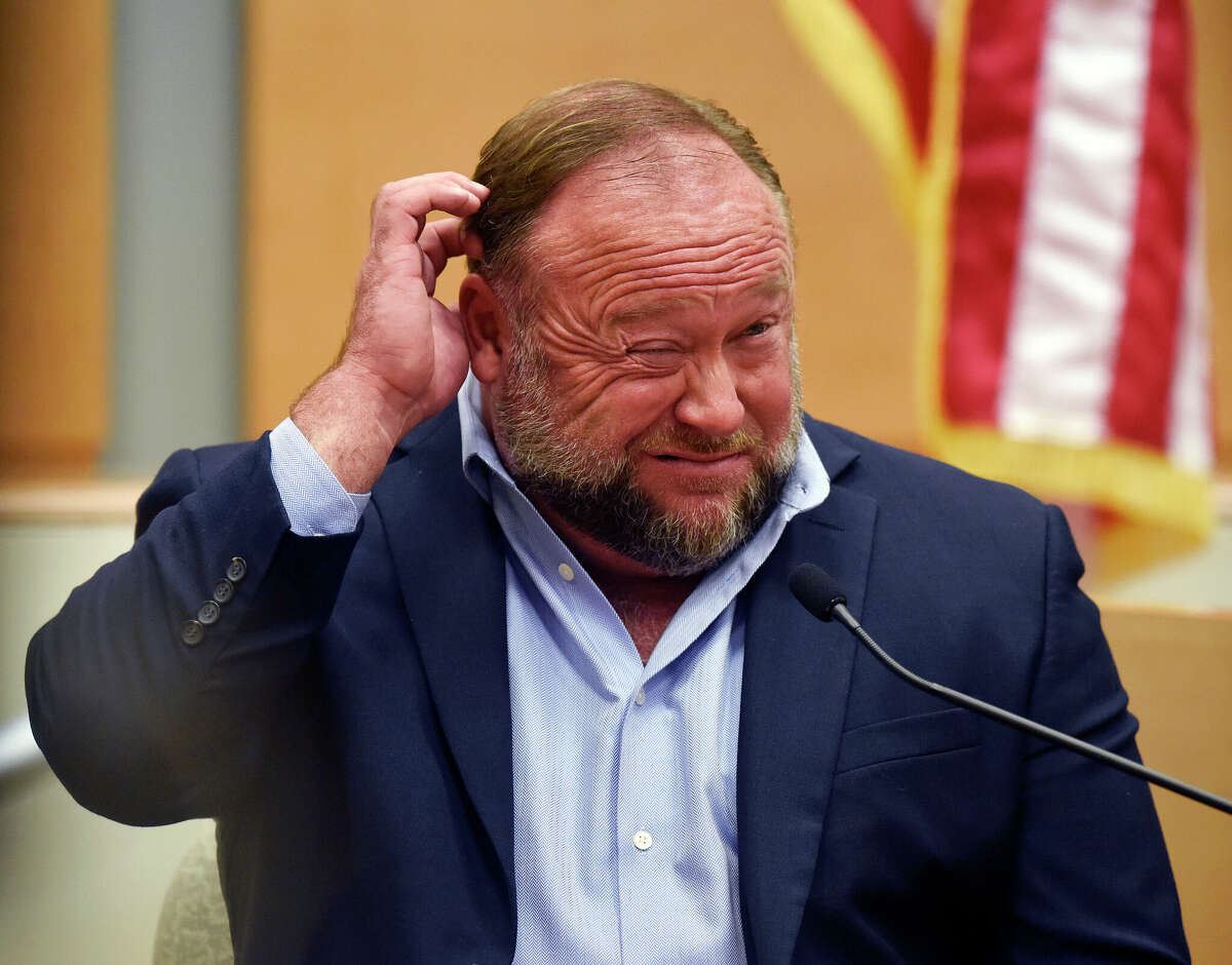 Infowars founder Alex Jones takes the witness stand to testify at the Sandy Hook defamation damages trial at Connecticut Superior Court in Waterbury, Conn. Thursday, Sept. 22, 2022.