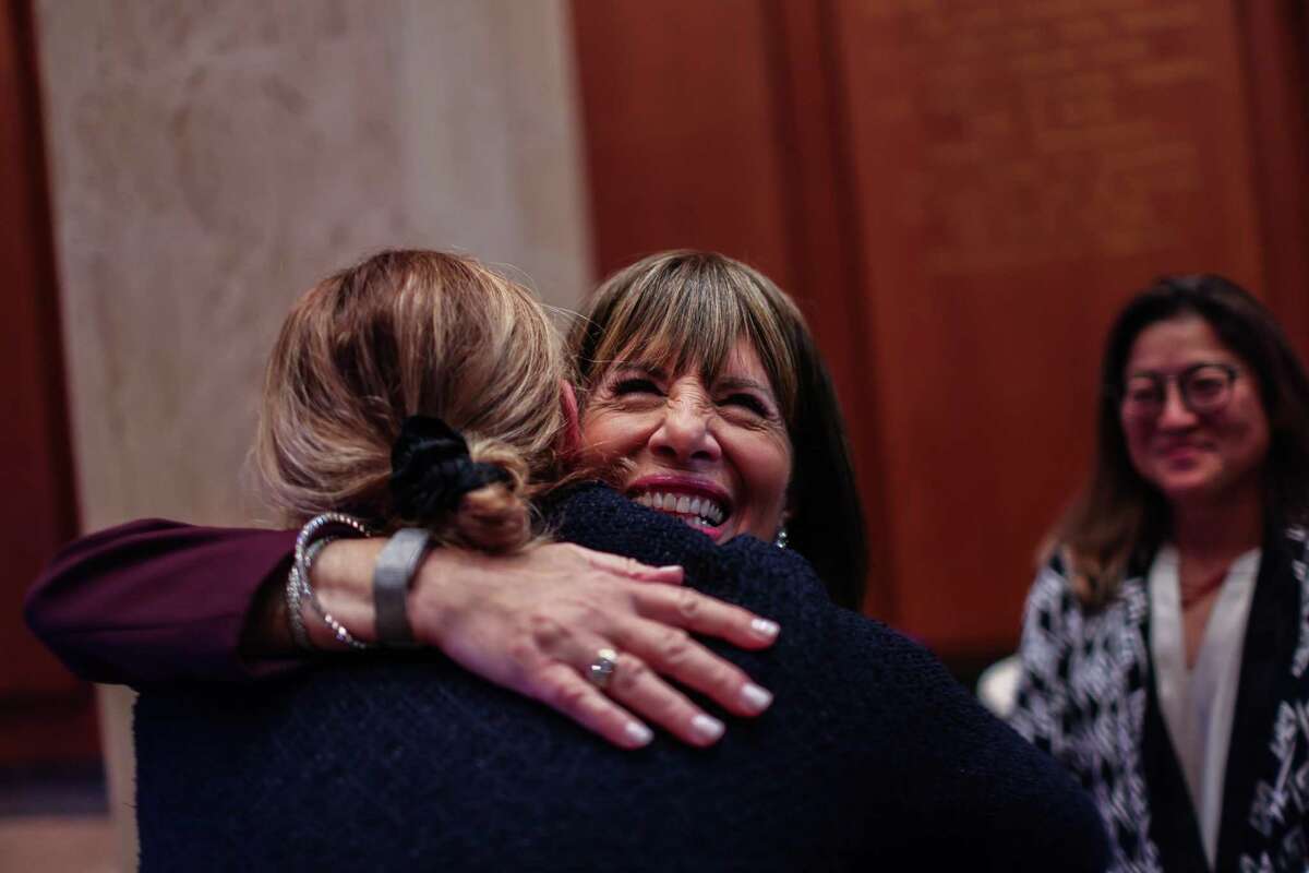 Rep. Jackie Speier embraces a friend at her retirement party in Washington last month.