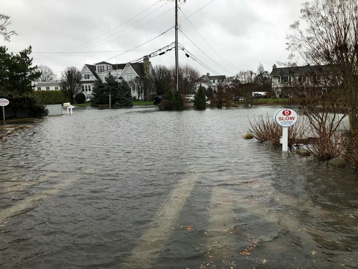 Flood waters emergence  successful  the Saugatuck country  of Westport connected  Friday.