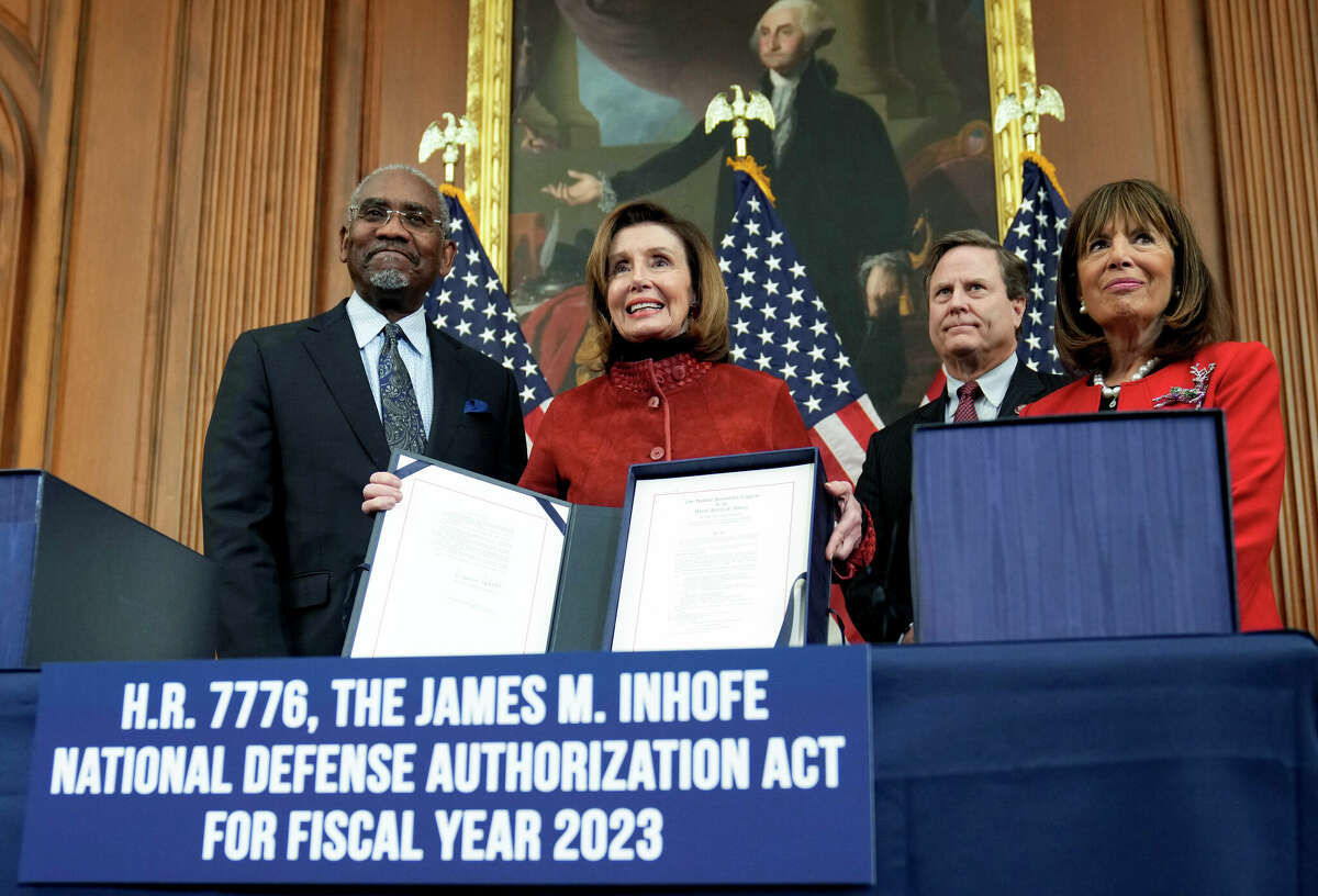 From left, Rep. Gregory Meeks, D-N.Y., Speaker of the House Nancy Pelosi, D-Calif., and Rep. Jackie Speier, D-Calif., attend a news conference on the bill enrollment ceremony for H.R. 7776, the James M. Inhofe National Defense Authorization Act for Fiscal Year 2023, Thursday, Dec. 22, 2022, on Capitol Hill in Washington. (AP Photo/Mariam Zuhaib)