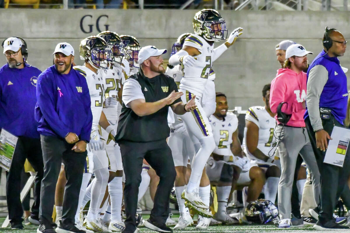 Washington offensive coordinator, Ryan Grubb, applauds a play by the Huskies offense against Cal on Saturday, October 22, 2022.