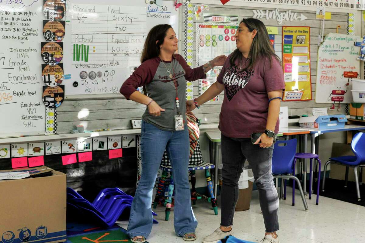First grade teacher April Elrod and kindergarten teacher Veronica Mata talk about how their day went at Dalton Elementary in Uvalde on Dec. 13. Both teachers lost 10-year-old daughters in the Robb Elementary mass shooting, Makenna Elrod and Tess Mata.
