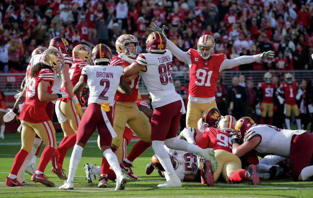 The 49ers defense holds the Commanders from getting into the end zone taking over on downs in the first half as the San Francisco 49ers played the Washington Commanders at Levi’s Stadium in Santa Clara, Calif., on Saturday, December 24, 2022.