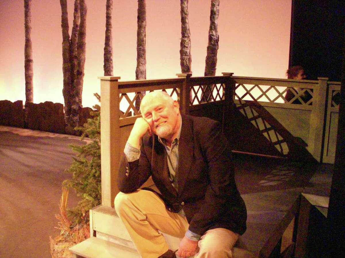 Composer, musical director and Professor James McElwaine pauses on the set of "Three Sisters" at the Performing Arts Center at Purchase College before opening night tonight.