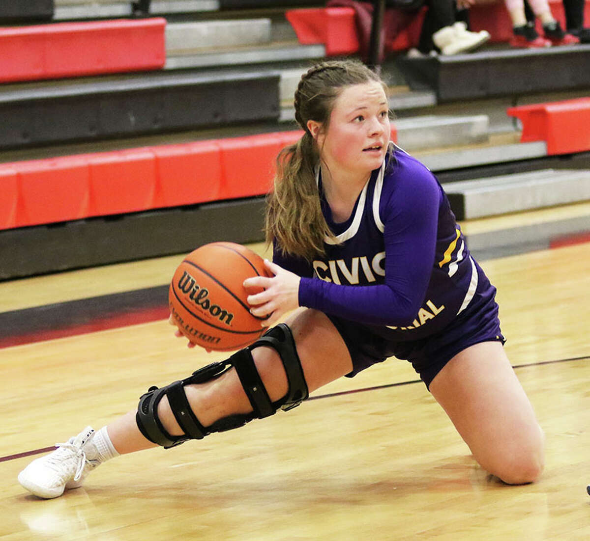 CM's Aubree Wallace looks for a teammate after retrieving a loose ball after making a backcourt steal against the Bulldogs in a MVC girls basketball game Dec. 19 in Highland.