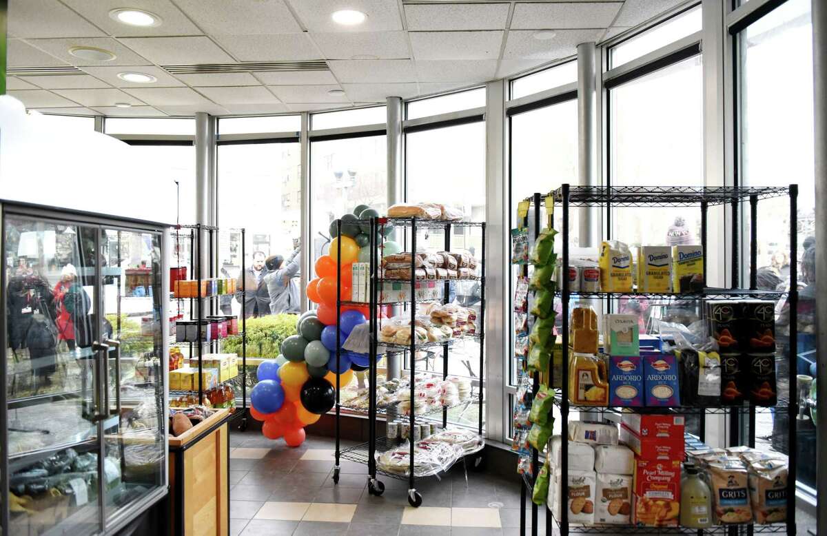 Shelves are stocked with food at the South End Grocery during its opening day ribbon cutting event on Tuesday, Dec. 27, 2022, in Albany, N.Y.